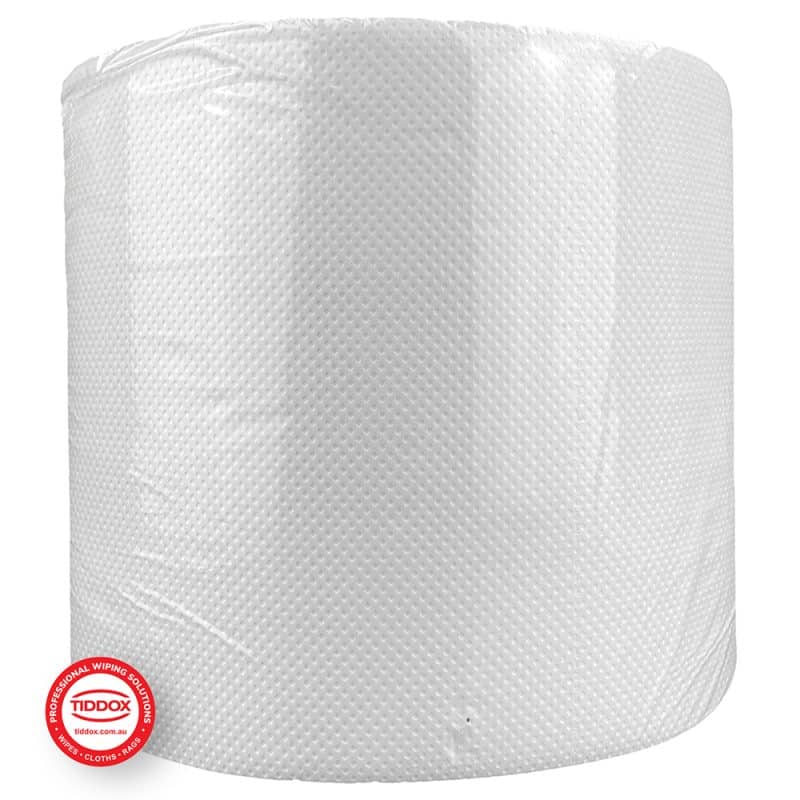 Side view of a plastic wrapped white jumbo hand towel roll