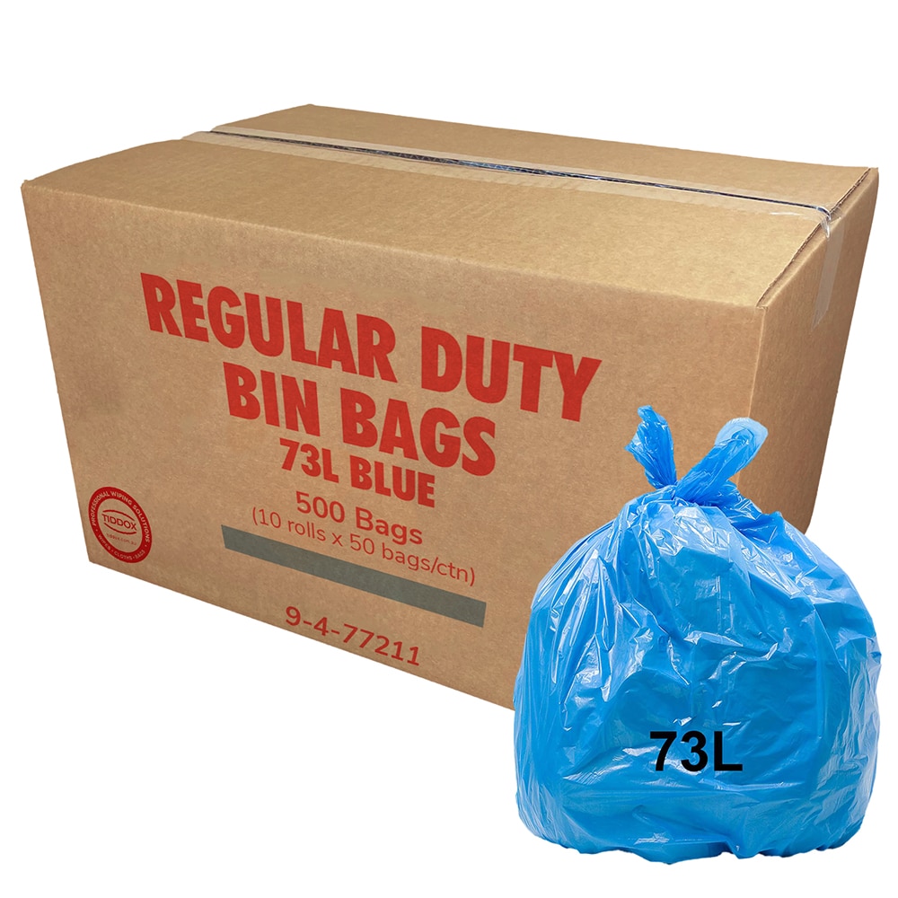 A carboard with red writing and a blue bin liners at the bottom right corner with a 73L