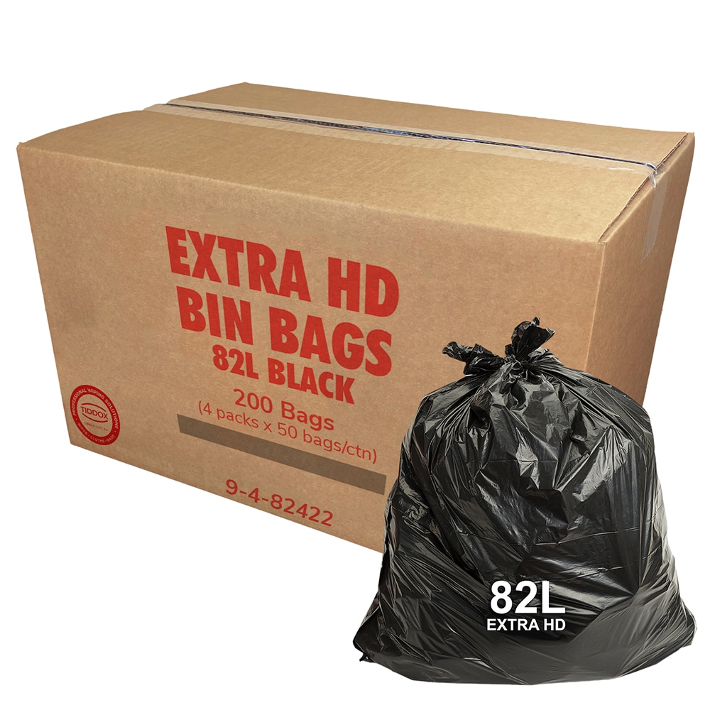 A carboard box with red writing saying "Extra Heavy Duty Bin Liners" and a black bin liner at the bottom right corner with a 82L
