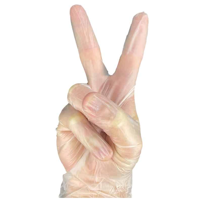 A hand in clear vinyl gloves showing a peace sign