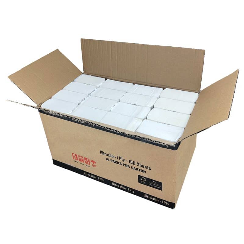 Open brown and black cardboard box with white hand towel inside