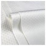 Close up of the quilted texture of thick wipes ("Polysoft wipes") with a curve in the middle