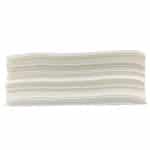 Side view of a pile of stacked wipes with a plain background