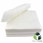 Pile of stacked TIDDOX M3 cellulose wipes with the uppermost wipe gracefully curved backward at an angle.
