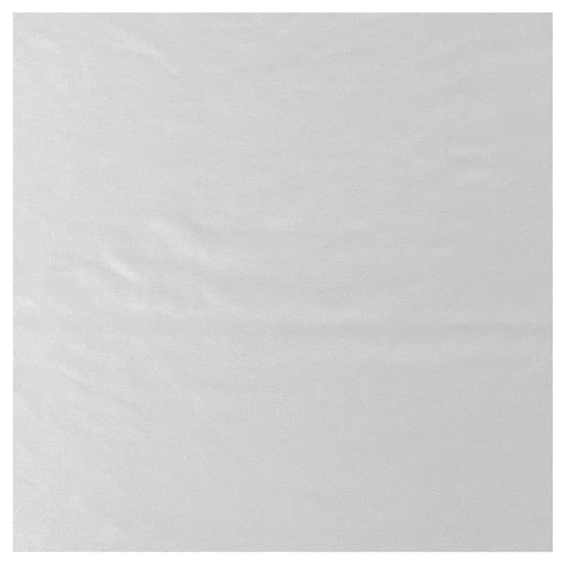 Overhead view of a knitted wipe displaying its fiber composition on a white background.