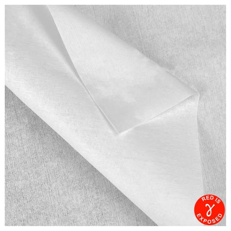 a top view of TIDDOX Polyester Cellulose Sterile wipes with the top wipe curved to the righthand corner