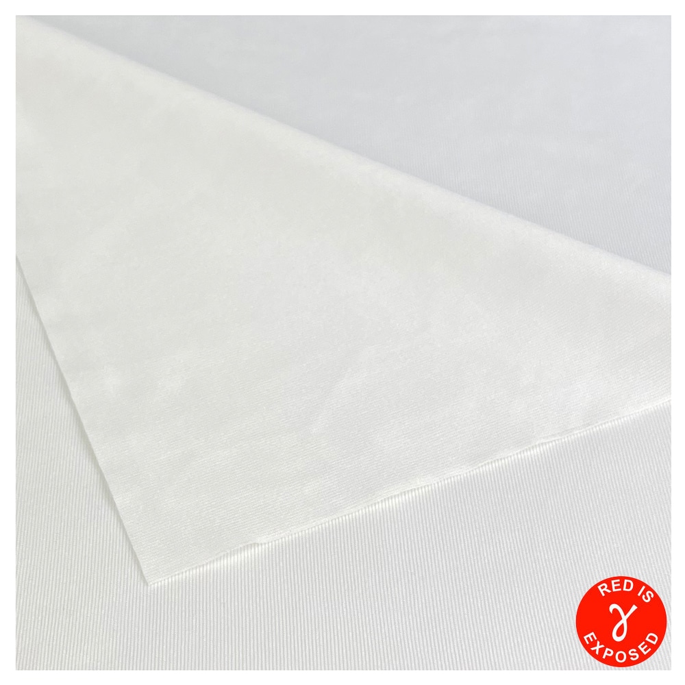 Close up view of a Sterile Polyester Knit Wipes with the top layer curved downward