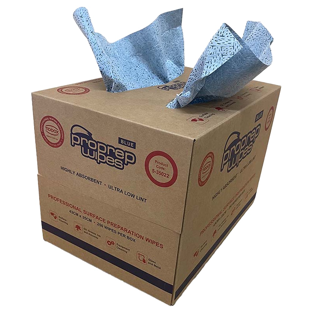 Brown carry-sized dispenser box of blue Proprep Wipes with two wipes sticking out the top
