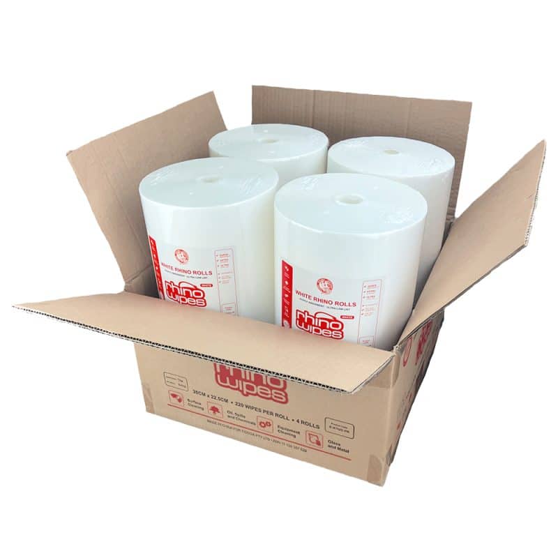 Open box with four white cleaning wipes roll wrapped in clear packaging and red writing vertically stacked