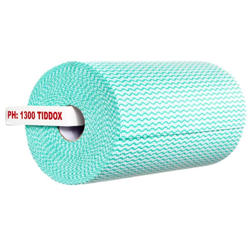 Wall-mounted dispenser for wipes rolls in white with red writing with a green wipes roll attached